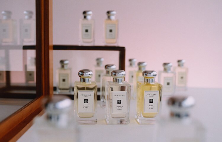 image of a selection of 100ml cologne bottles on a mirrored base