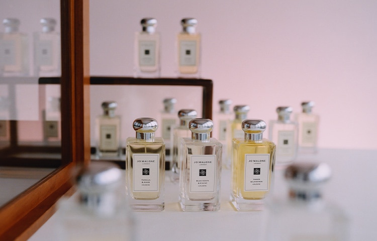 image of a selection of 100ml cologne bottles on a mirrored base